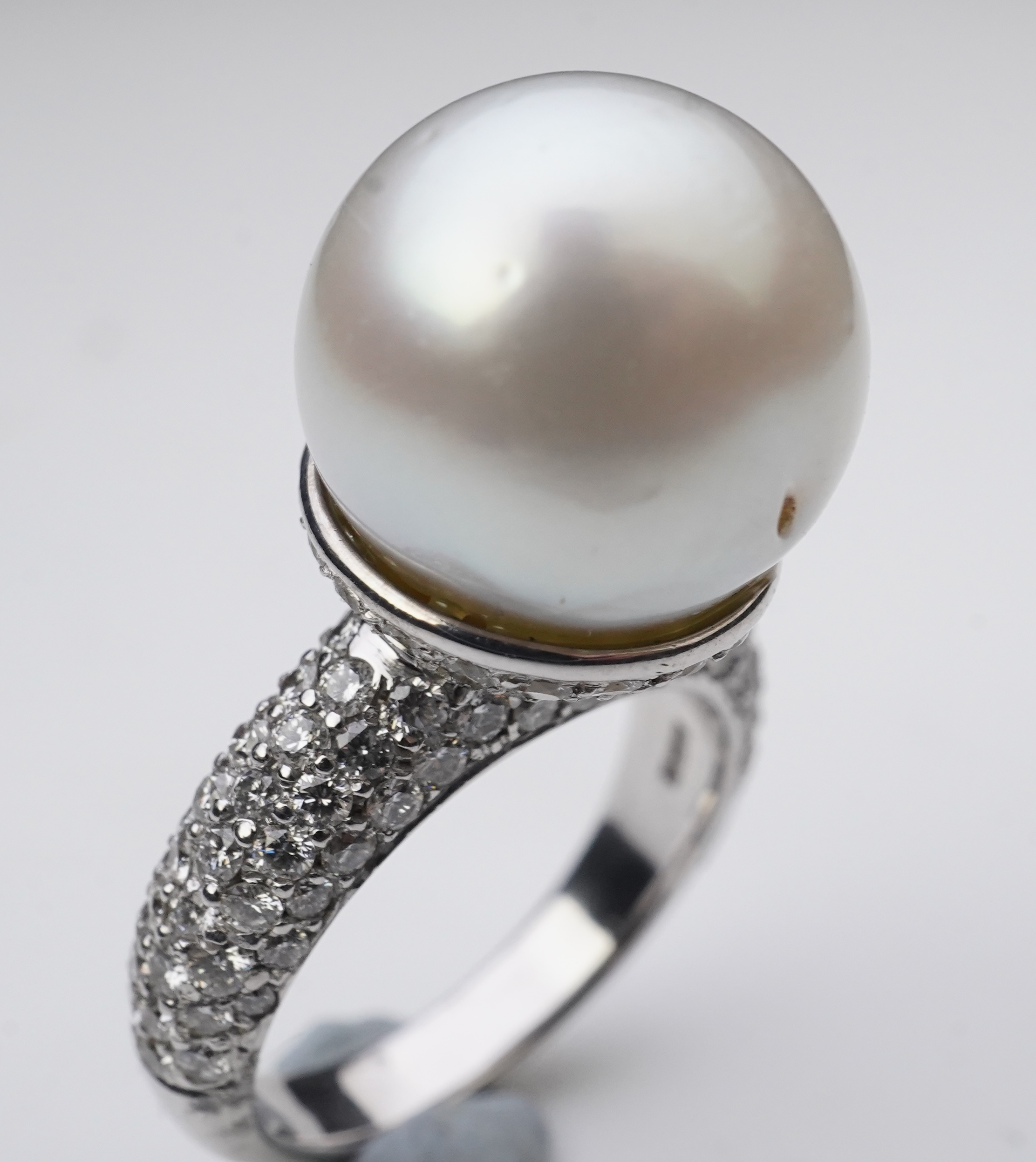 A South Sea cultured pearl and diamond ring